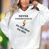 "Never Underestimate An Old Man On Skis" | Funny Graphic Unisex Adult Hoodie | Skiing Lifestyle