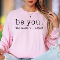 "be you. The world will adjust" | Bold Typography Unisex Adult Long Sleeve T-Shirt | Confidence Lifestyle