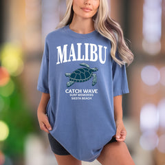 "MALIBU Catch Wave Surf Memories" | Comfort Colors Unisex Adult T-Shirt | Coastal Lifestyle