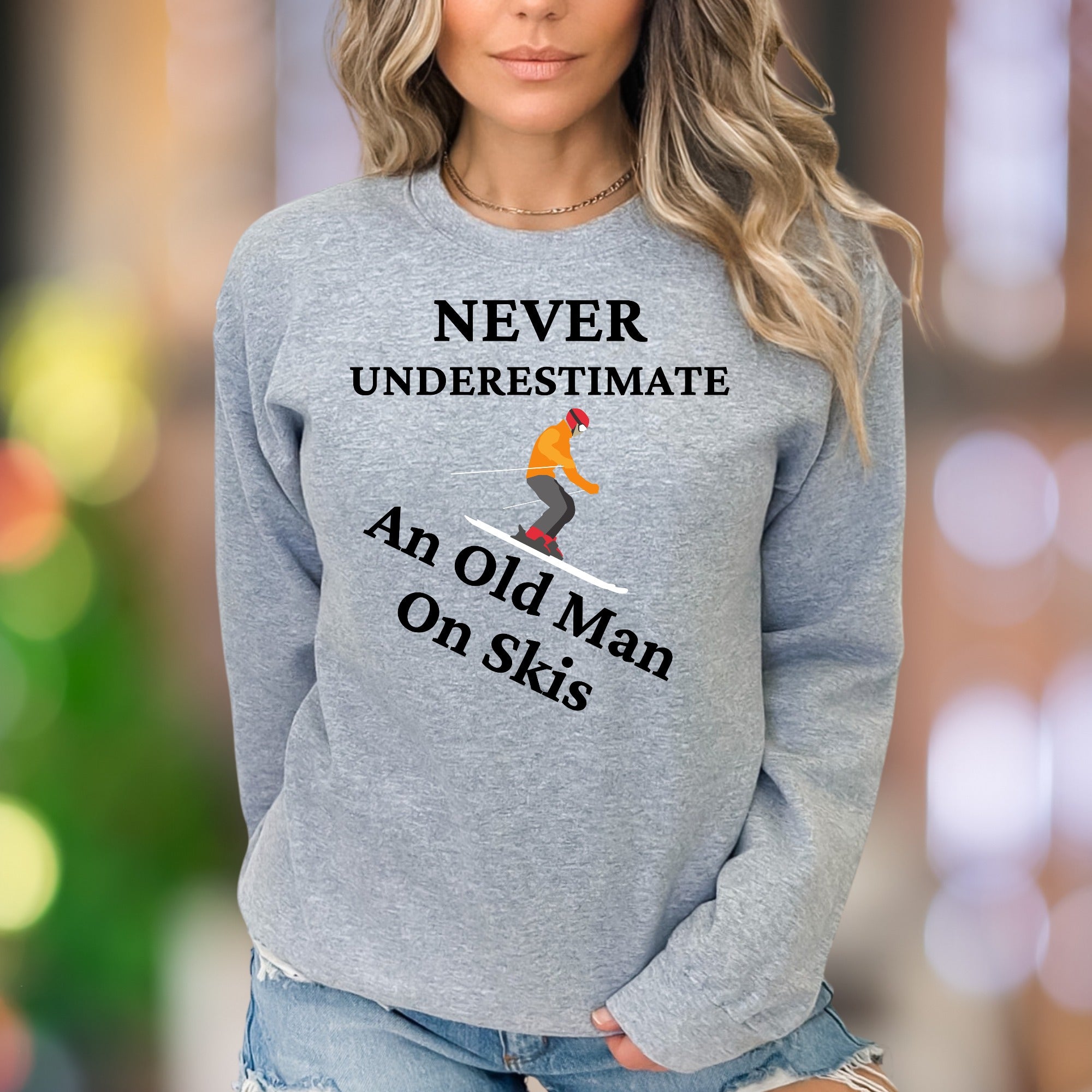 "Never Underestimate An Old Man On Skis" | Funny Graphic Unisex Adult Sweatshirt | Skiing Humor
