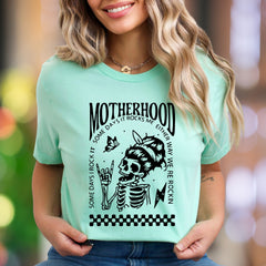 "Motherhood - Some Days I Rock It, Some Days It Rocks Me" | Bold Retro Unisex Adult T-Shirt | Edgy Mom Life