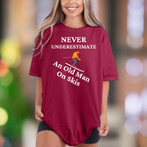 "Never Underestimate An Old Man On Skis" | Comfort Colors Unisex Adult T-Shirt | Funny Skiing Lifestyle