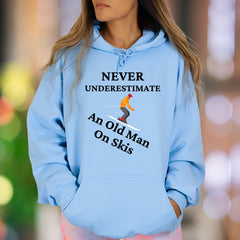 "Never Underestimate An Old Man On Skis" | Funny Graphic Unisex Adult Hoodie | Skiing Lifestyle