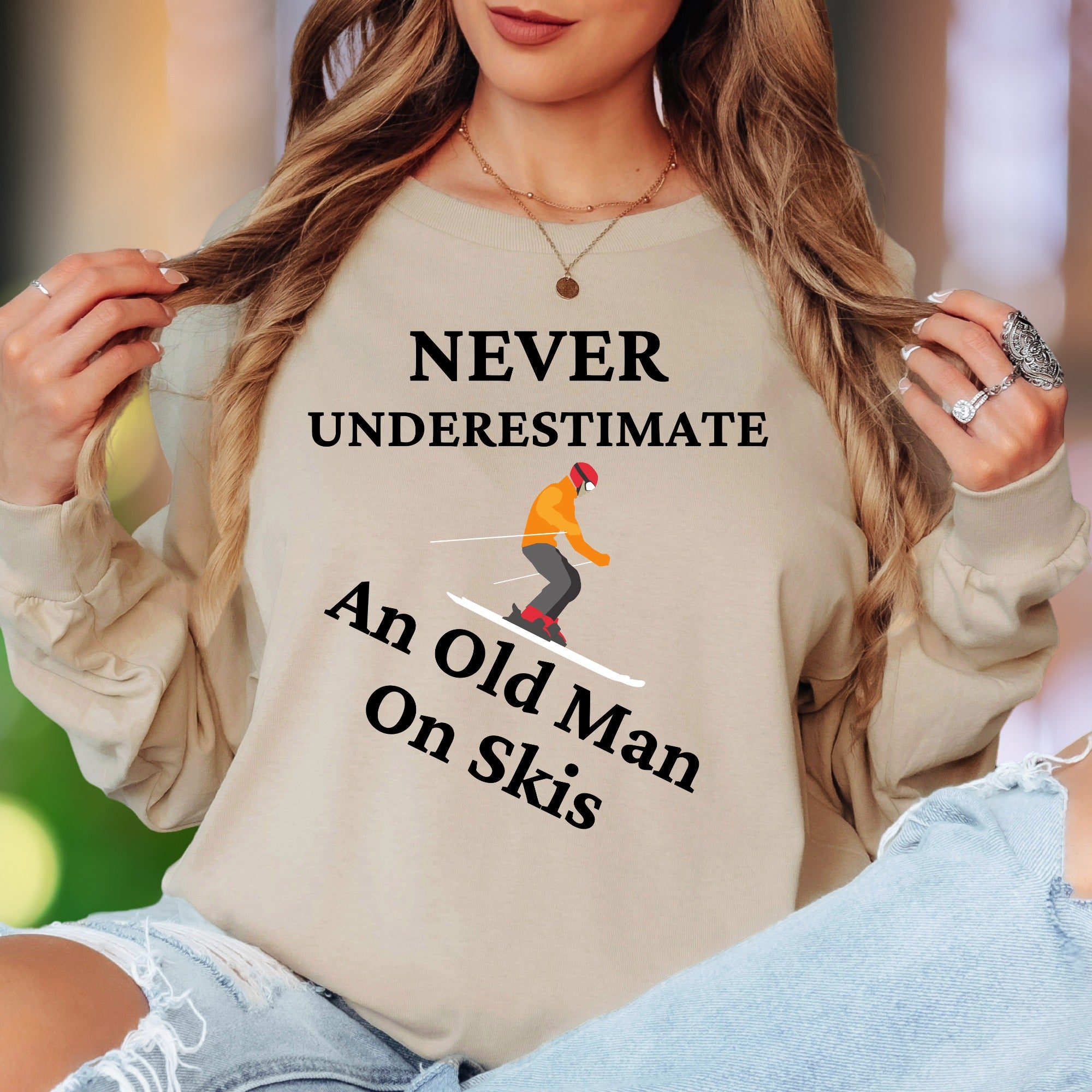 "Never Underestimate An Old Man On Skis" | Funny Illustrated Unisex Adult Long Sleeve T-Shirt | Skiing Humor Main image