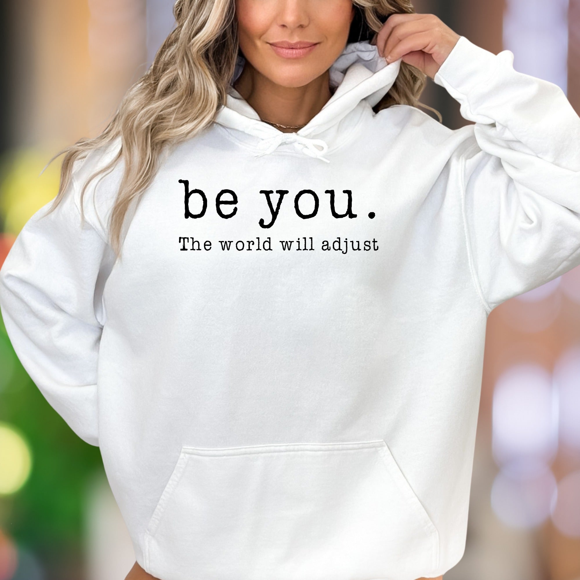 "be you. The world will adjust" | Motivational Typography Unisex Adult Hoodie | Self-Expression Apparel