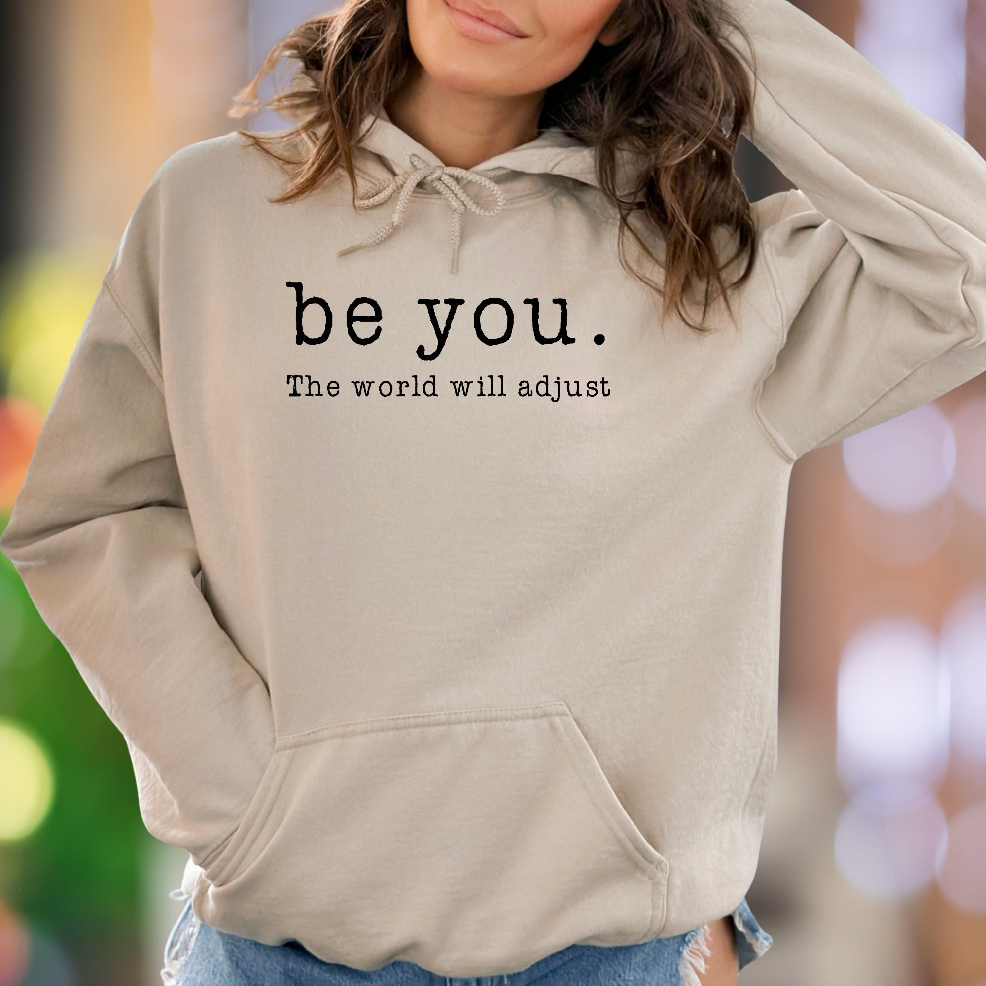 "be you. The world will adjust" | Motivational Typography Unisex Adult Hoodie | Self-Expression Apparel