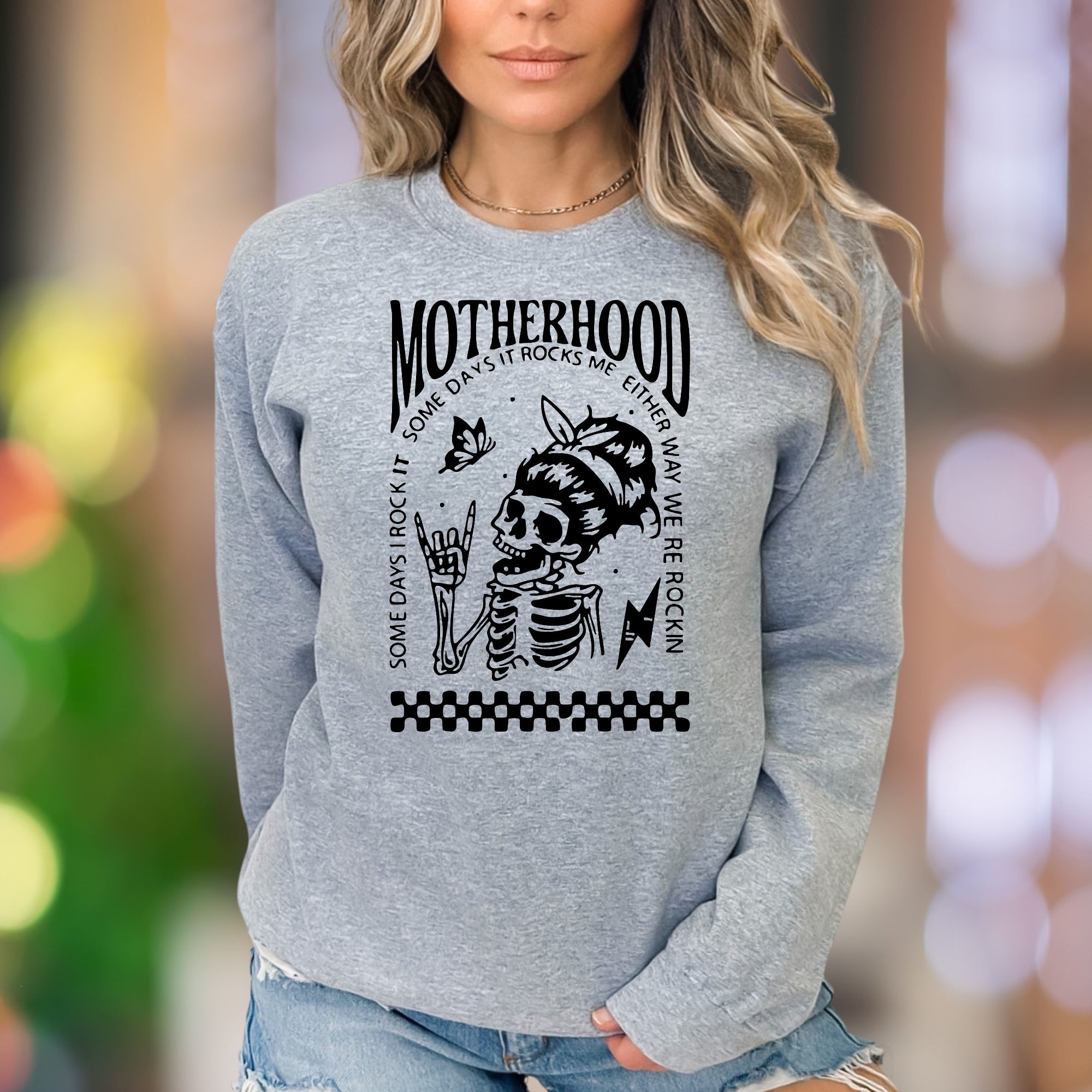 "Motherhood: Some Days I Rock It, Some Days It Rocks Me" | Bold Skeleton Unisex Adult Sweatshirt | Rocker Mom Lifestyle