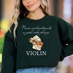 "Never Underestimate A Girl Who Plays Violin" | Musical Graphic Unisex Adult Sweatshirt | Creative Lifestyle