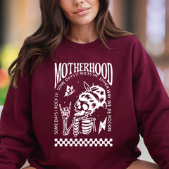 "Motherhood: Some Days I Rock It, Some Days It Rocks Me" | Bold Skeleton Unisex Adult Sweatshirt | Rocker Mom Lifestyle