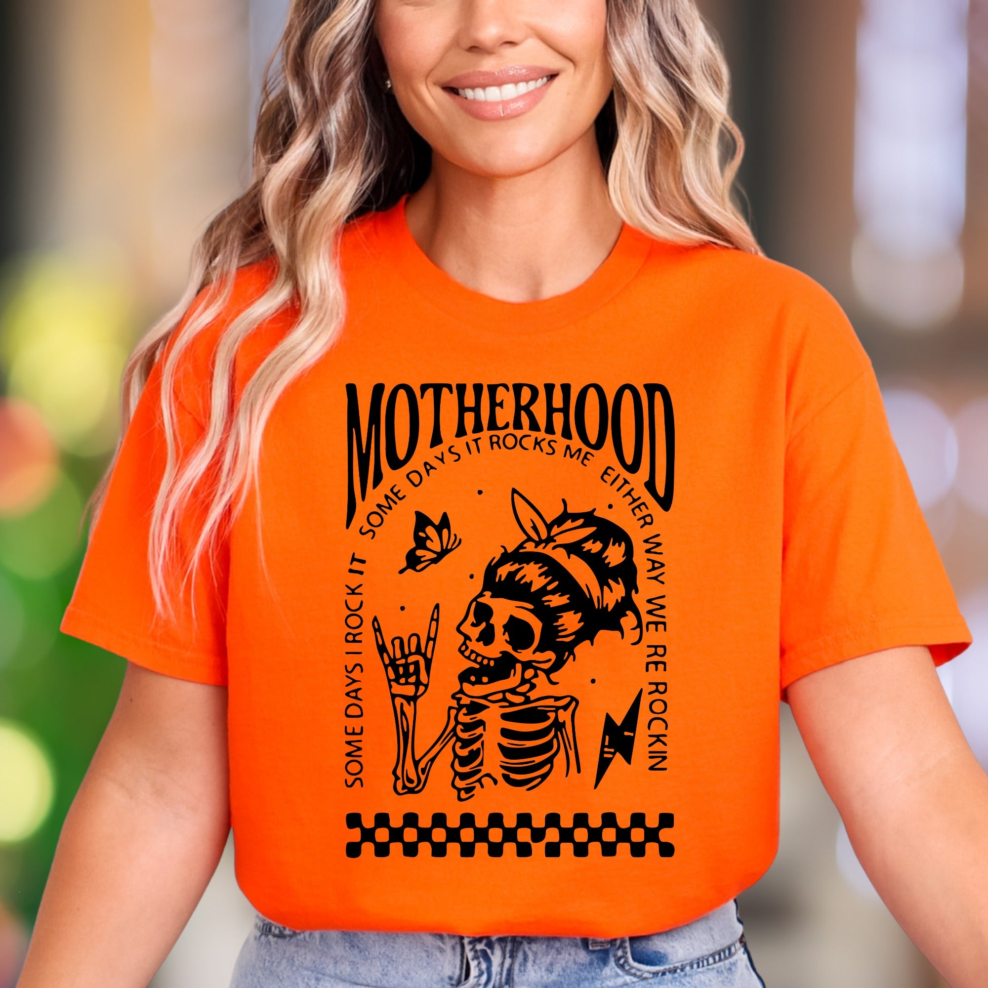 "Motherhood - Some Days I Rock It, Some Days It Rocks Me" | Bold Retro Unisex Adult T-Shirt | Edgy Mom Life