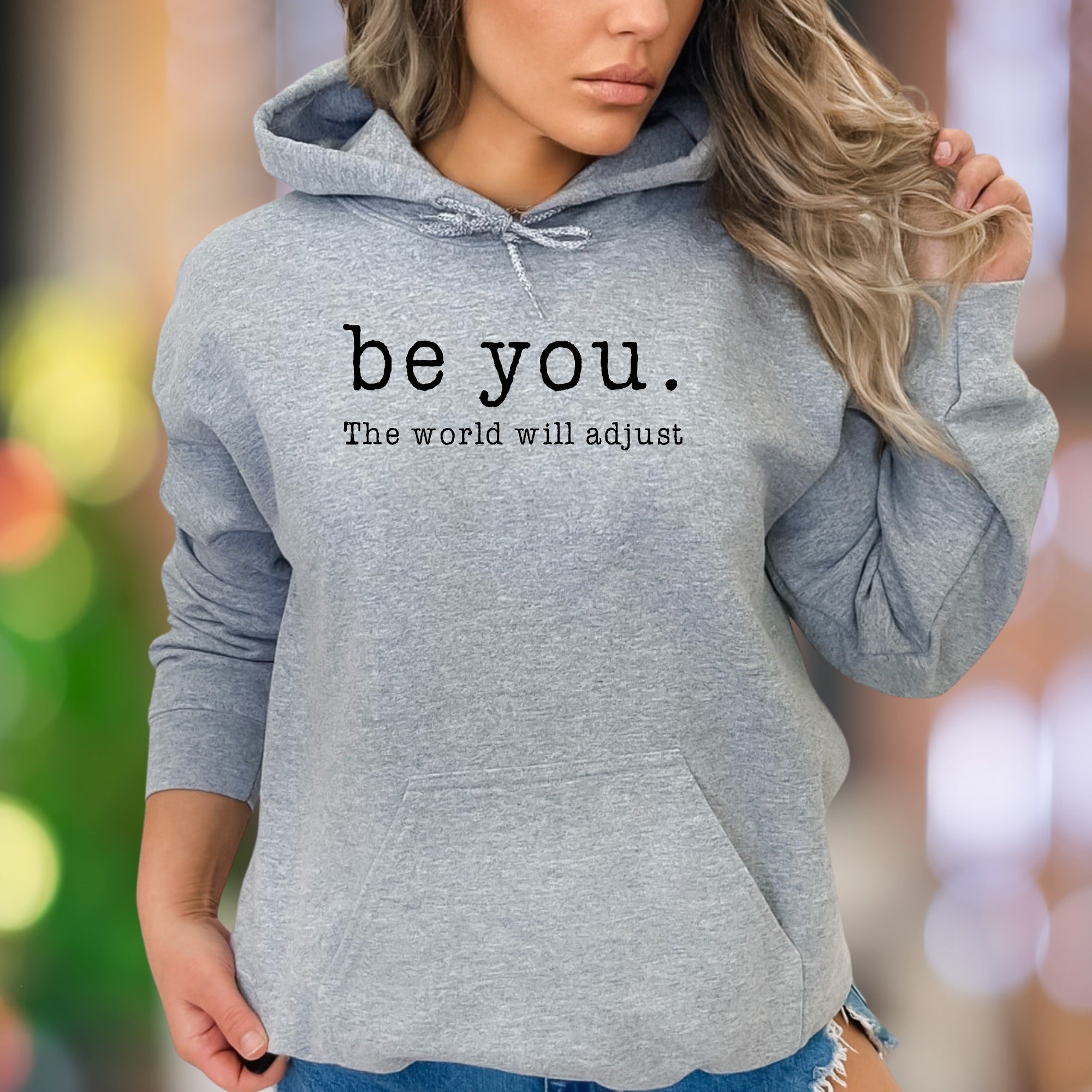 "be you. The world will adjust" | Motivational Typography Unisex Adult Hoodie | Self-Expression Apparel