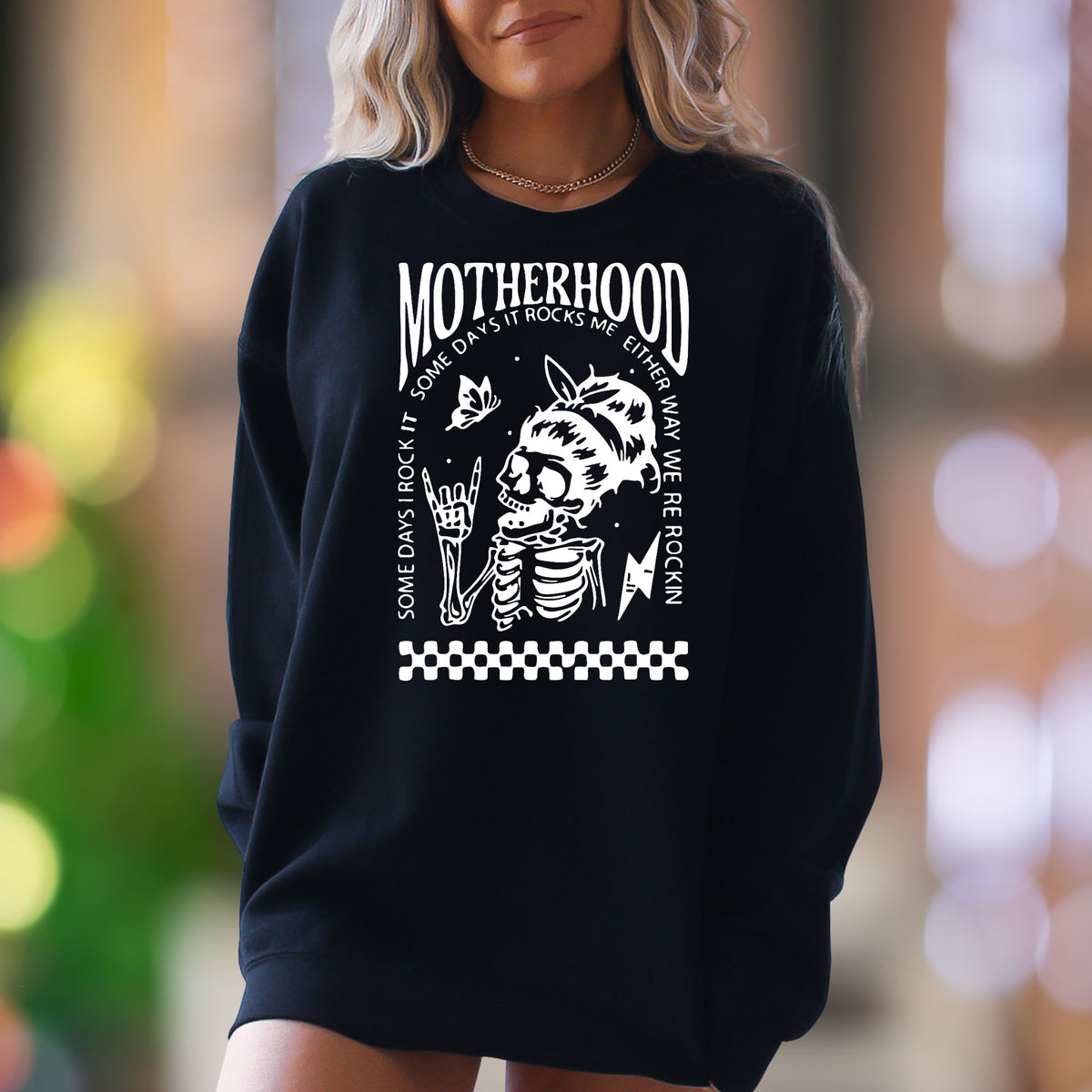 "Motherhood: Some Days I Rock It, Some Days It Rocks Me" | Bold Skeleton Unisex Adult Sweatshirt | Rocker Mom Lifestyle